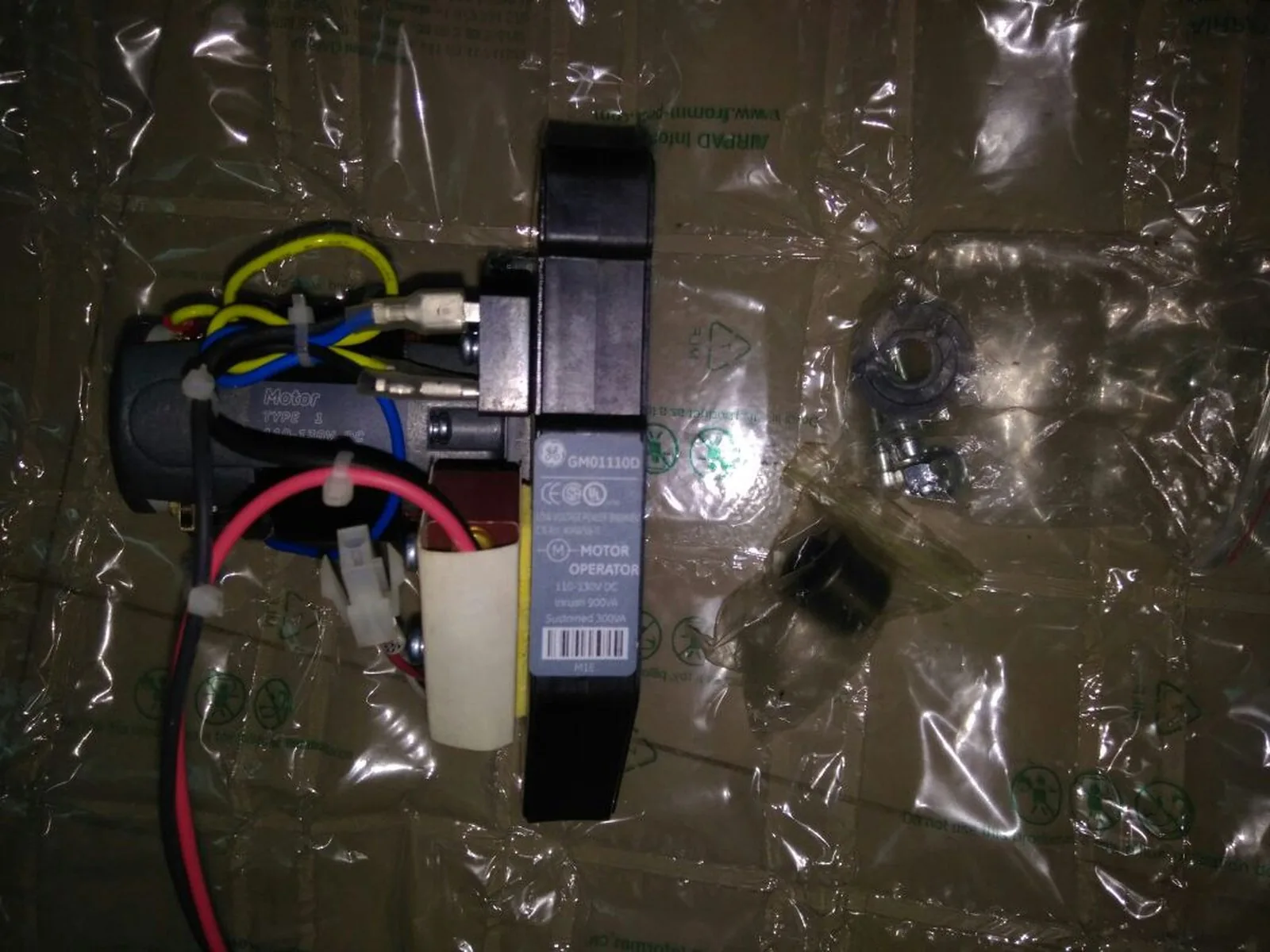 GE entelliguard motor operator assembly 110 130v dc closeup accessory for entelliguard g circuit breakers a supplied goods evidence for electrical switchgear / breaker spares by Impro Solutions Bangladesh and Impro Solutions UK.